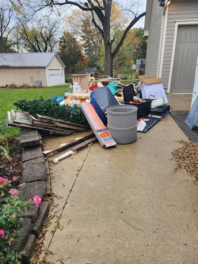 Dumpster being loaded with debris for Residential Dumpster Rental in Jamul